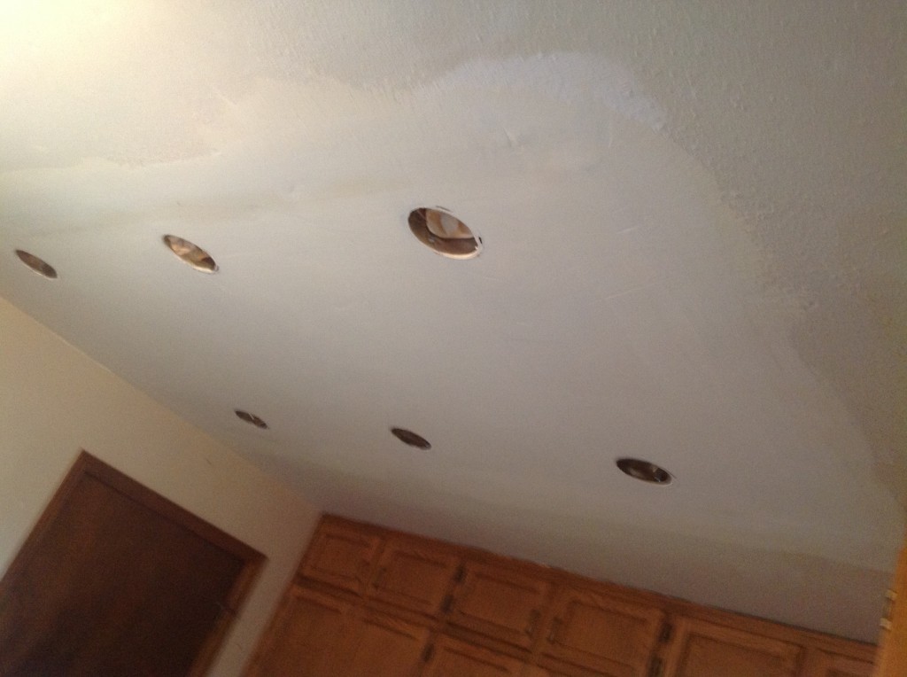 Mudded ceiling repair with new can lights by Bragg Construction