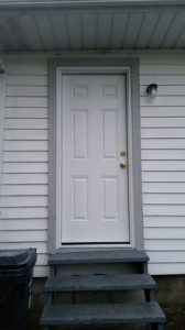 Completed door exterior with clean up job site by Bragg Construction