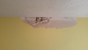 Removal of loose water-damaged plaster